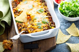 Traditional mexican meat casserole with cheese and vegetables
