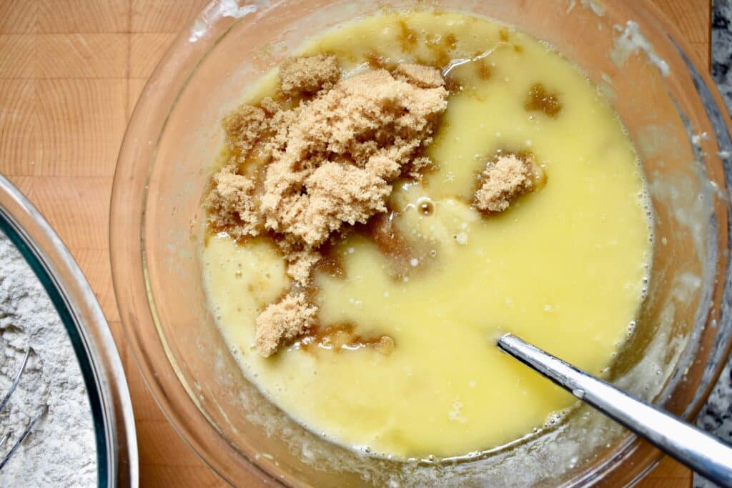 overhead shot of banana bread mixture with brown sugar melting in butter