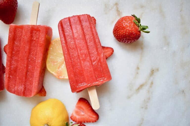 overhead shot of two strawberry popsicles