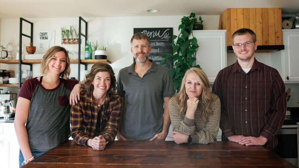 image of the Plan to Eat team standing around a kitchen island