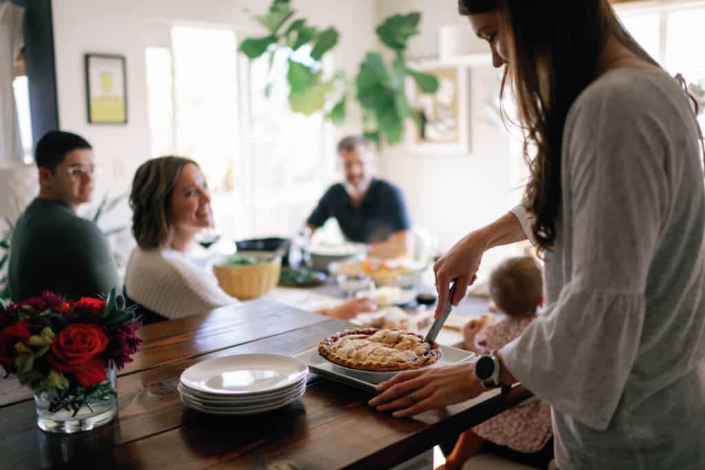 woman cutting pie