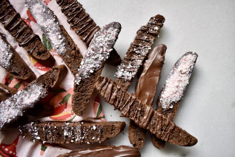 overhead shot of chocolate biscotti on a christmas napkin