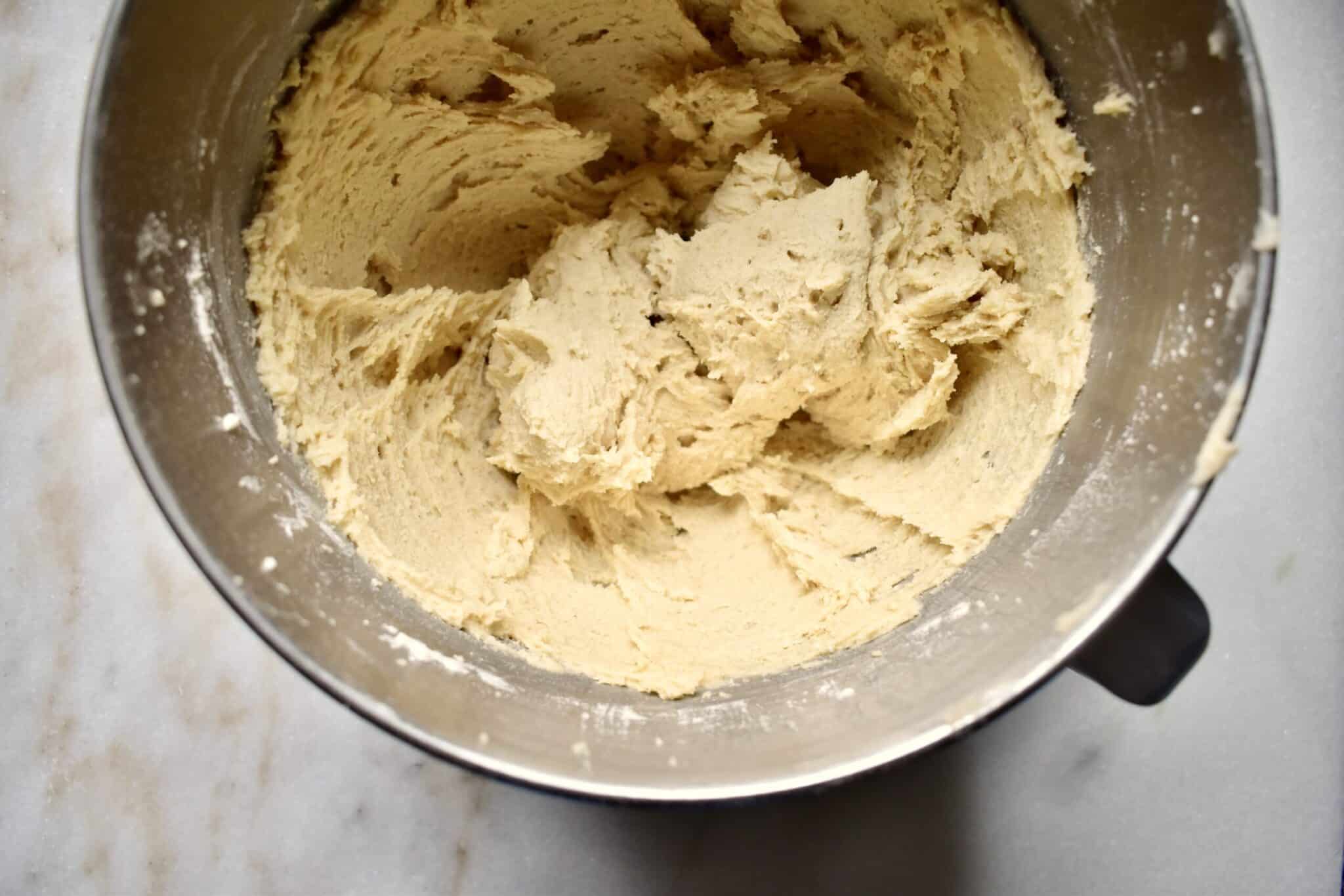 pizookie ingredients mixed together in mixer bowl