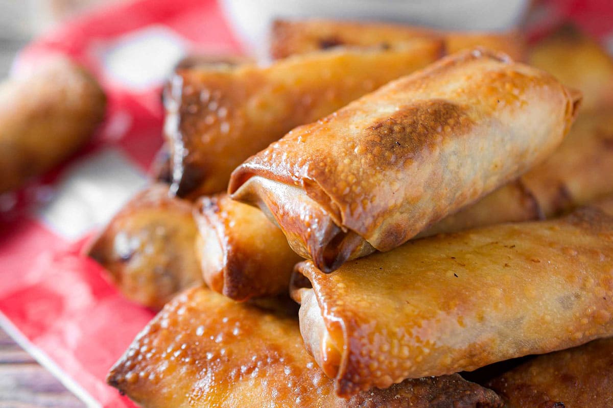 close up shot of perfectly cooked cheeseburger egg rolls