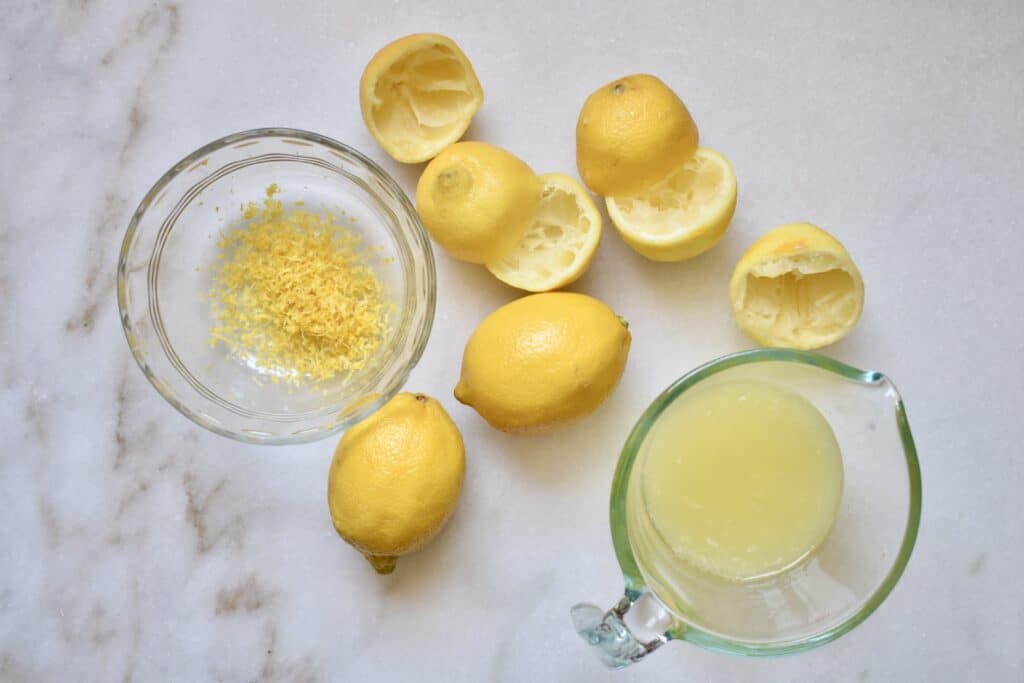 juicing and zesting lemons for the glaze