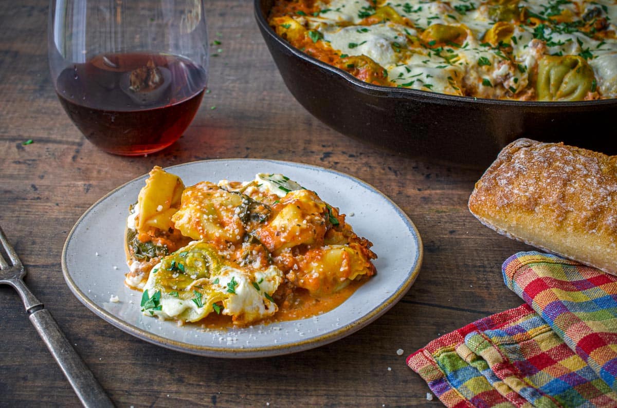 tortellini burrata recipe plated with a glass of wine