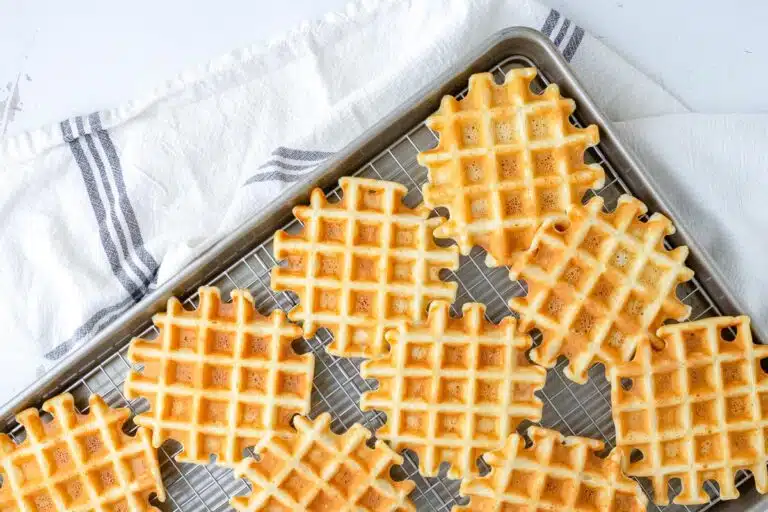 overhead view of waffles on a sheet pan